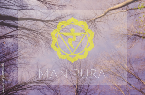 Manipura chakra symbol. Poster for yoga class with sky view. photo