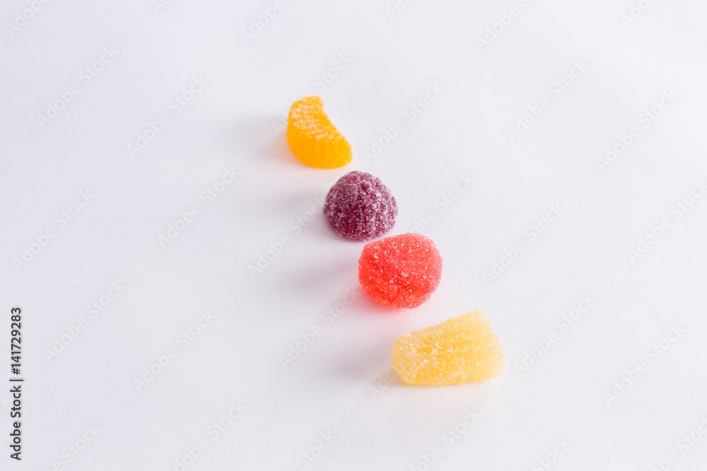Bright tasty marmalade on a white background Bright tasty marmalade on a white background