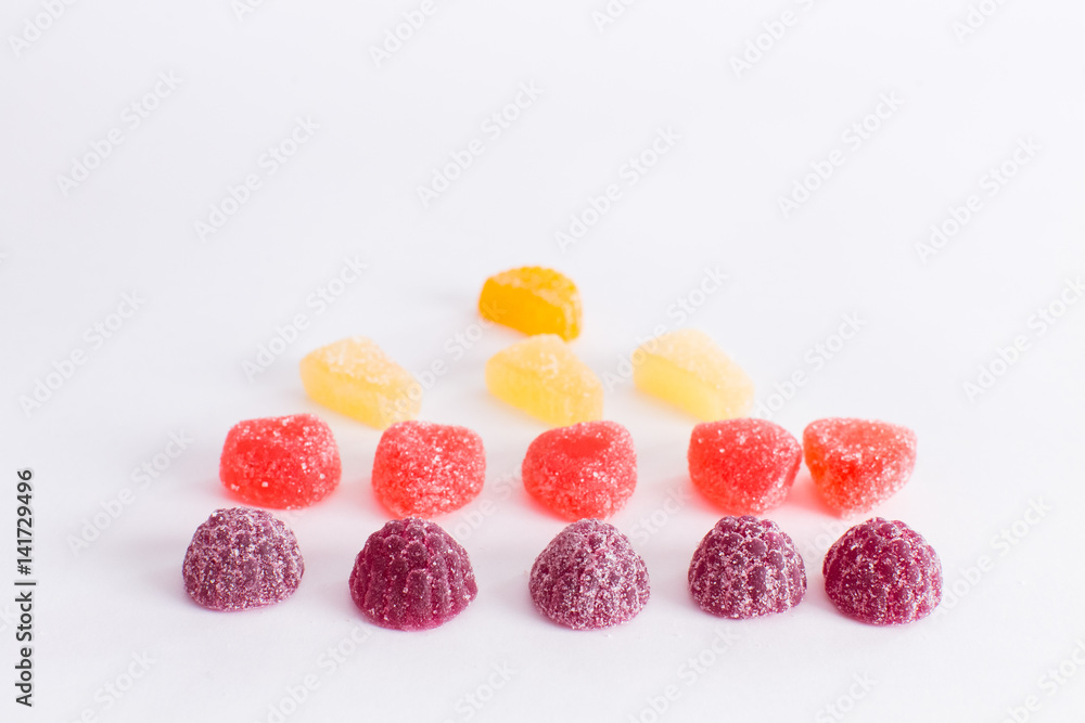 Bright tasty marmalade on a white background Bright tasty marmalade on a white background