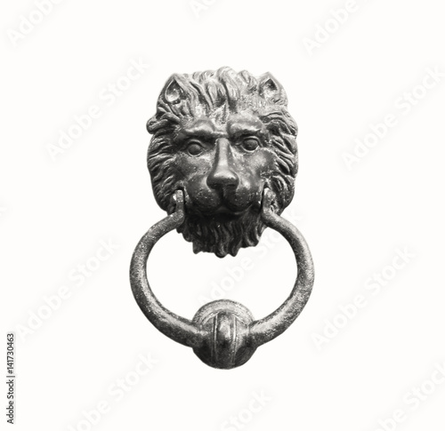 Old style lion's head knocker isolated on white, clipping path, antique effect (sepia).