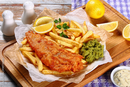 Photography delicious crispy fish and chips on plate