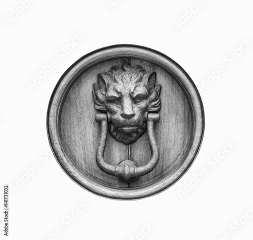 Old style lion's head knocker isolated, clipping path, black and white.