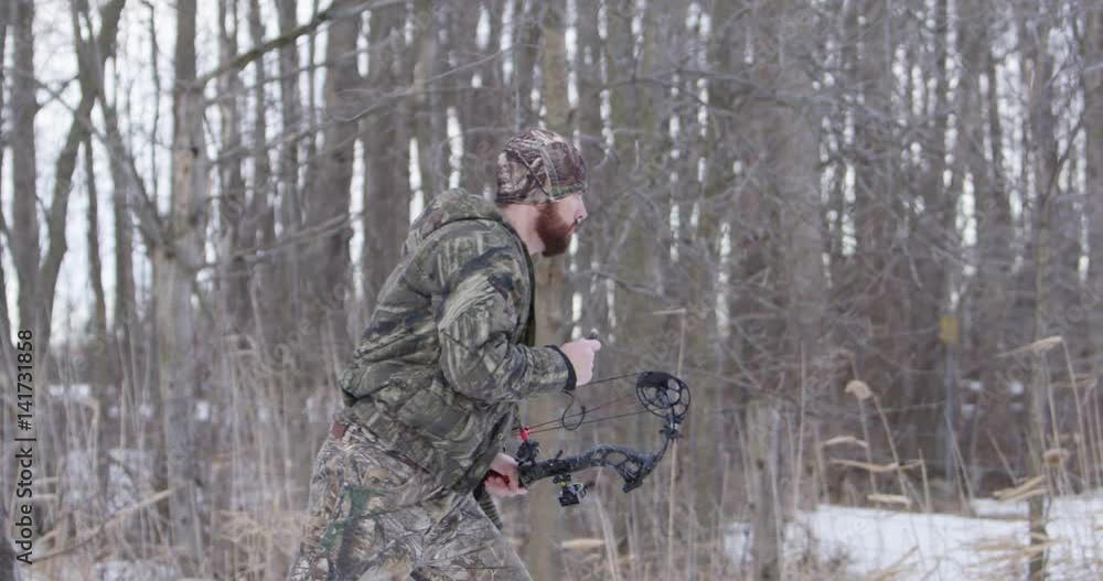bow hunter shoots and runs slow motion 120fps 4k bow hunter shoots and runs slow motion 120fps 4k