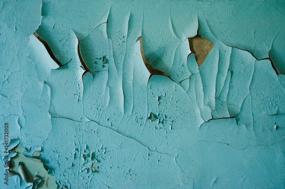 Swollen peeling paint on old wall background texture Stock Photo