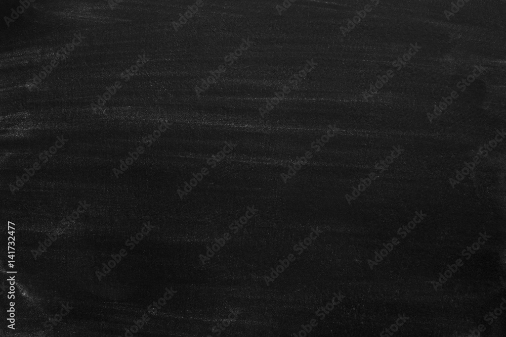 Chalk rubbed out on blackboard Chalk rubbed out on blackboard