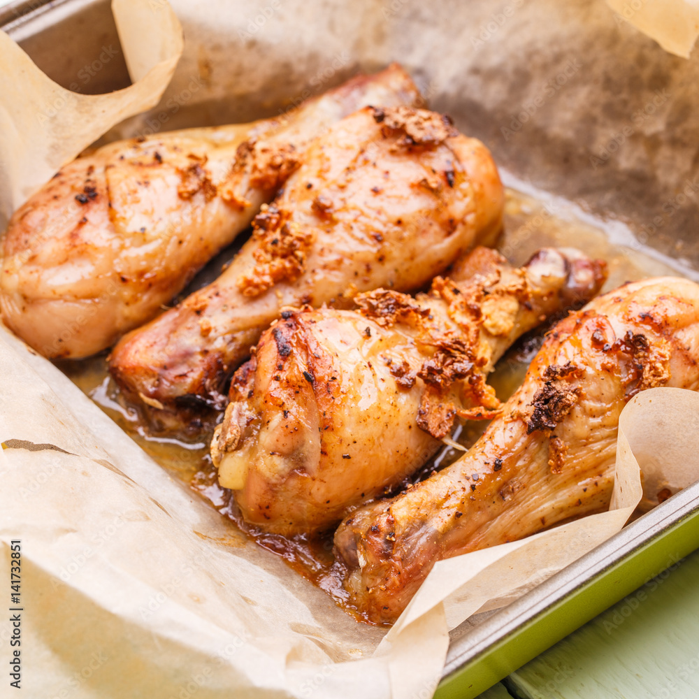 Prepared chicken on cooking paper Prepared chicken on cooking paper