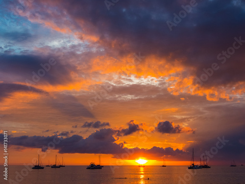 Ships on the background of beautiful sunset © antonbelo