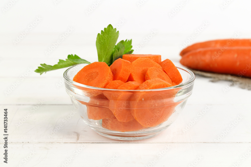 Fresh carrot with celery leaf on white background Fresh carrot with celery leaf on white background