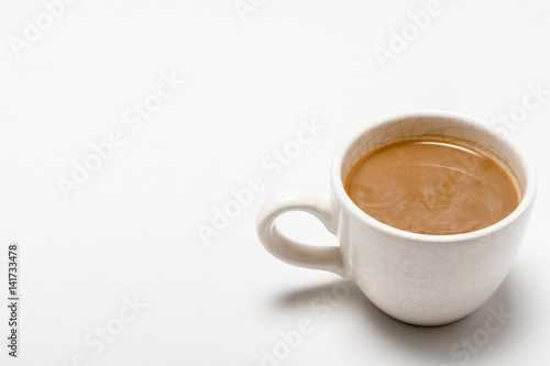Cup of coffee on white background. Free space for text