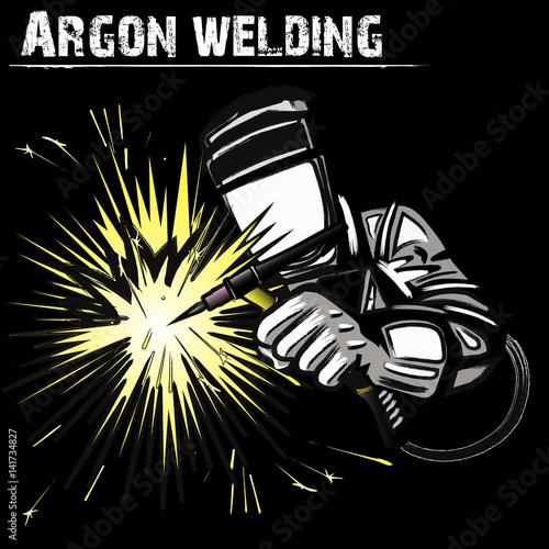 Welder in a mask performing argon welding of the metal