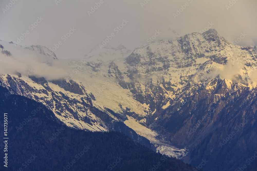 Meili snow mountain in sunrise and Mingyong glacier, at Feilai temple, Deqing, Yunnan, China
