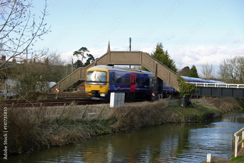 Fototapeta premium Canal, railway and train