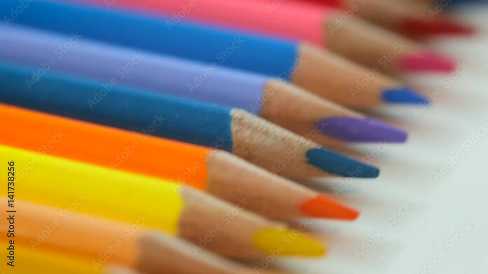 Color pencils on white table Color pencils on white table