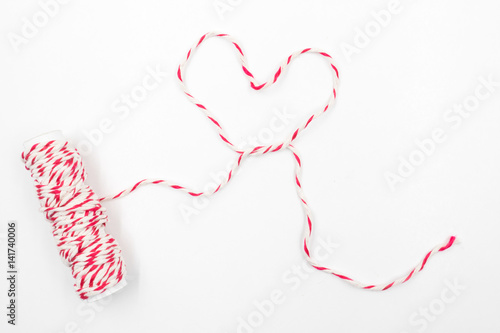 Rope heart shaped on a white background.