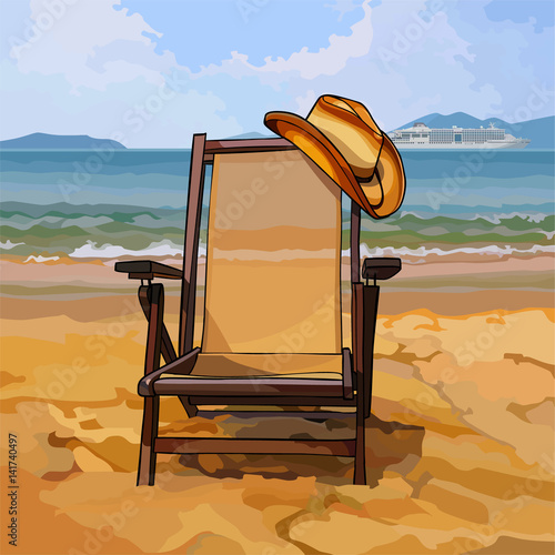chaise lounge with a hat on sandy beach