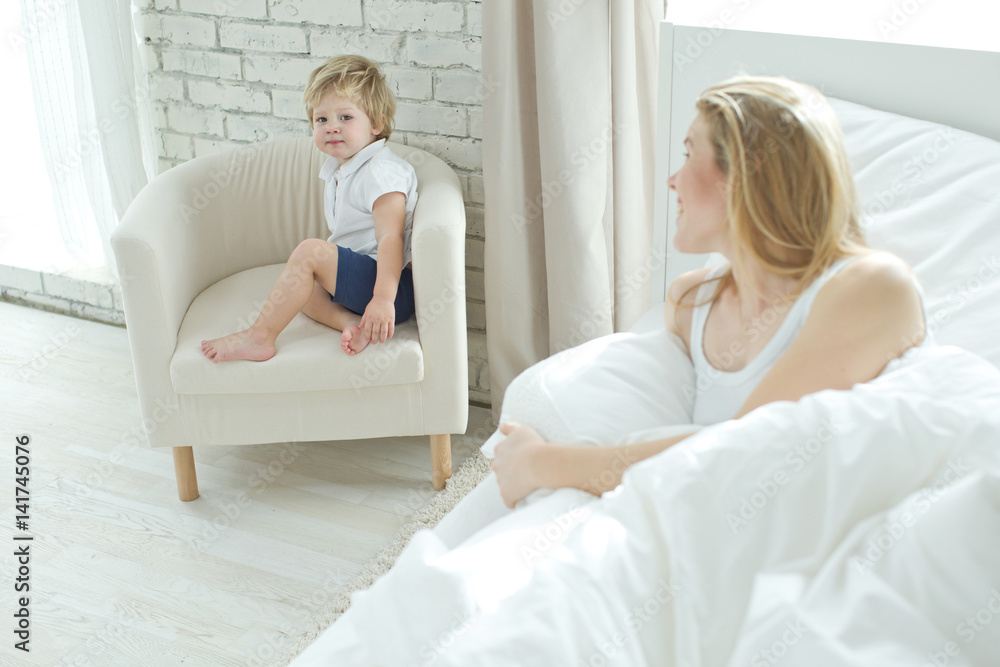 Woman with child at home Woman with child at home