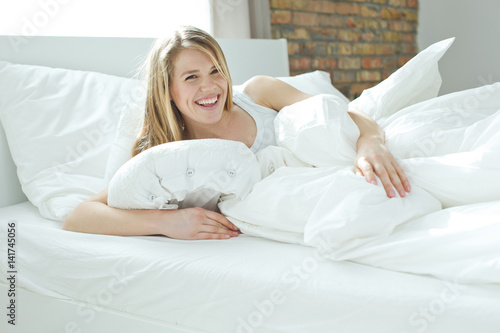 Woman smiles in the morning 