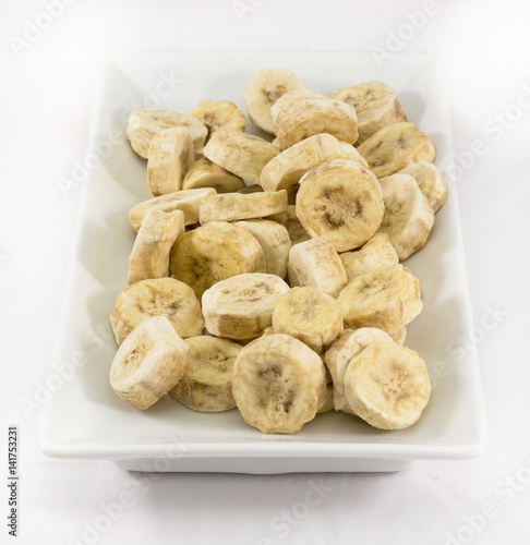 Pieces of banana in white plate