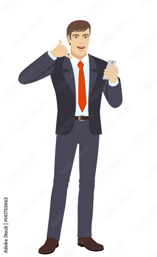 Businessman with mobile phone showing a call me sig Businessman with mobile phone showing a call me sig