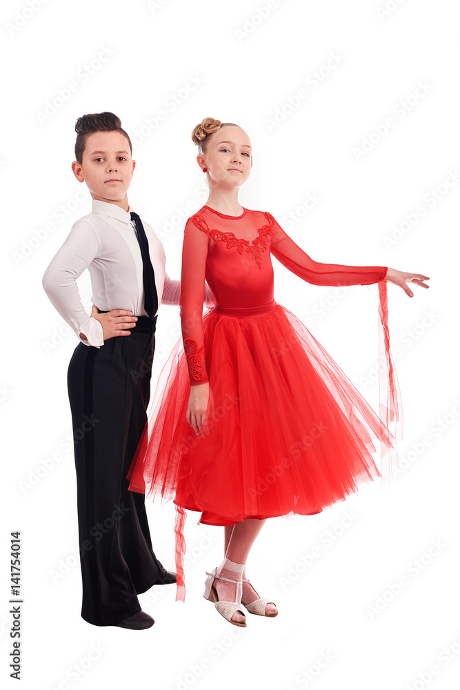 Lovely little boy and girl dancing. Isolated on white background Lovely little boy and girl dancing. Isolated on white background