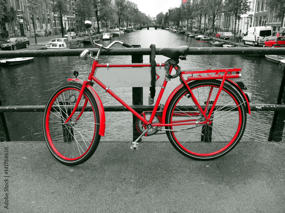 Red bicycle on the bridge