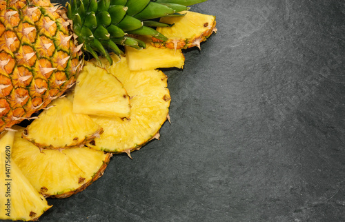 Pineapple on stone background with copy space