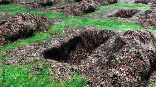 view of dug and empty graves ground. Open dumping. Religious place. Daylight