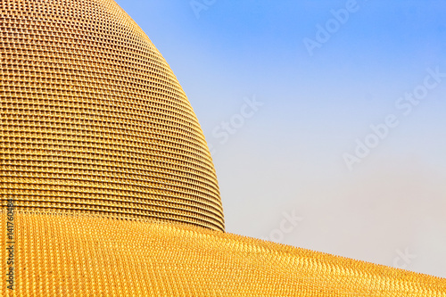 PATHUM THANI - February 11: Million golden Buddha figurine of Dhammakaya Pagoda at Wat Dhammakaya on February 11, 2017 in Pathum Thani, Thailand.