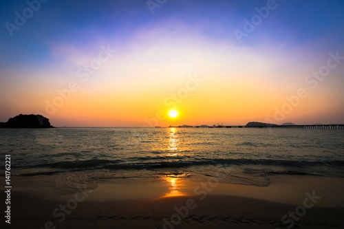 Beautiful sunset with reflection in the sea © bookybuggy