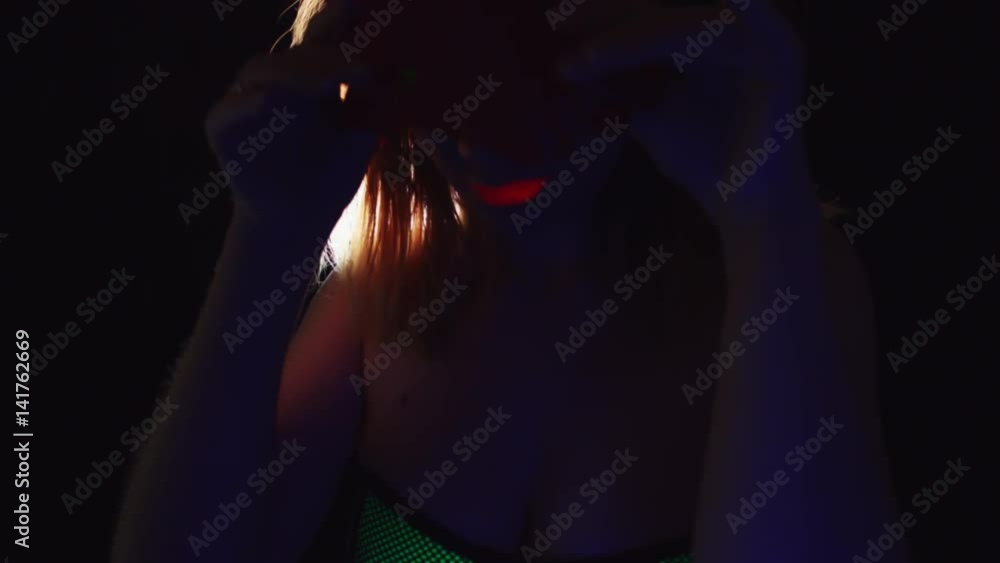 4K Disco Glow Neon Make-up Woman Posing with Ears 4K Disco Glow Neon Make-up Woman Posing with Ears