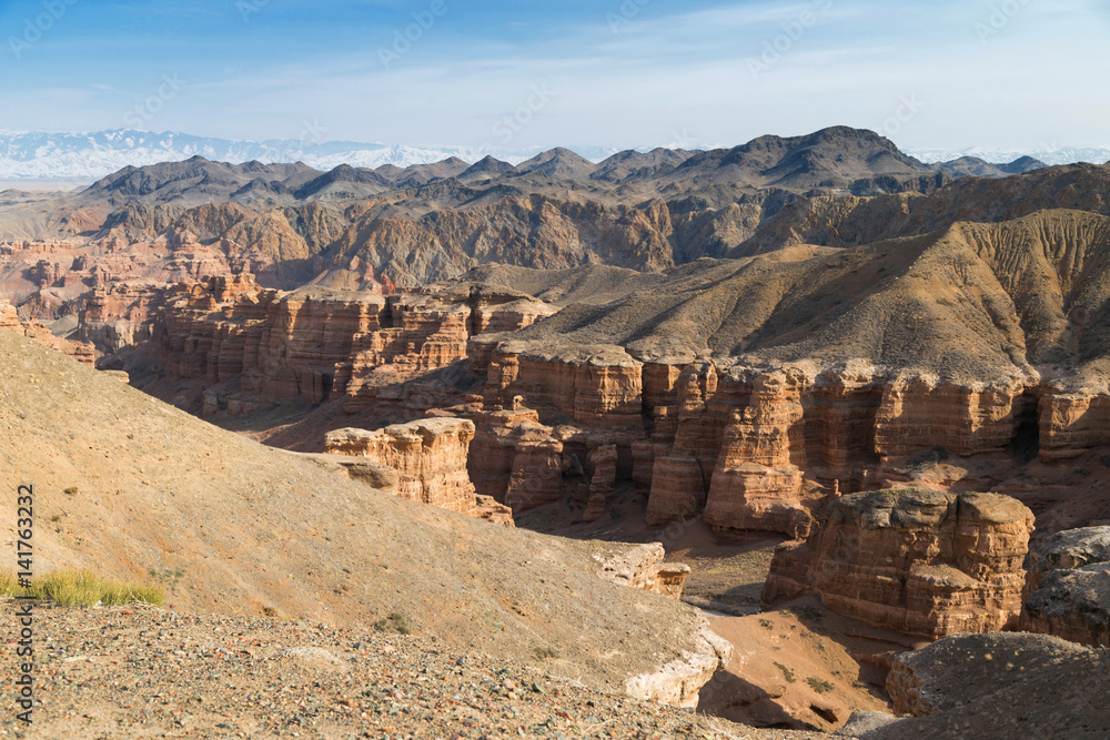 Sharyn Canyon panorama.
Panorama of the Valley of Castles in the Sharyn Canyon National Park, Kazakhstan. Snow-capped Tian Shan mountain range is in the background. Early spring sunny day. Sharyn Canyon panorama.
Panorama of the Valley of Castles in the Sharyn Canyon National Park, Kazakhstan. Snow-capped Tian Shan mountain range is in the background. Early spring sunny day.