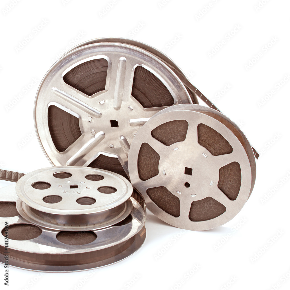 Obraz premium Old film reel with strip isolated on a white background.