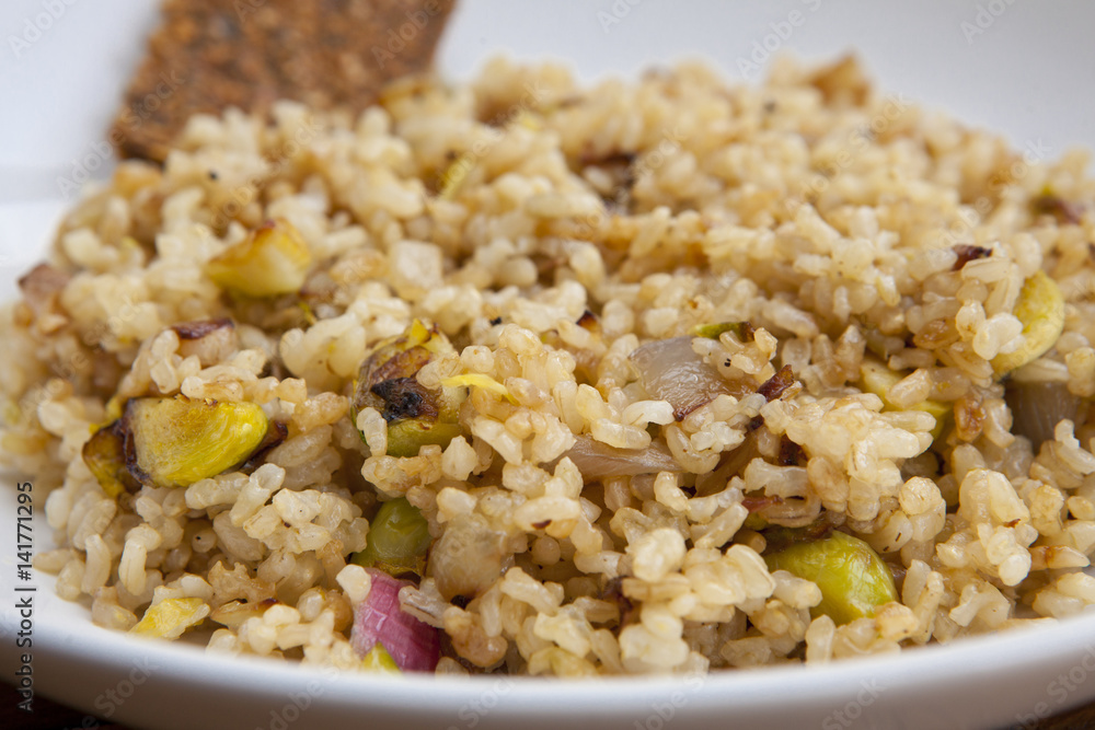 cooked integral rice with vegetables, closeup cooked integral rice with vegetables, closeup