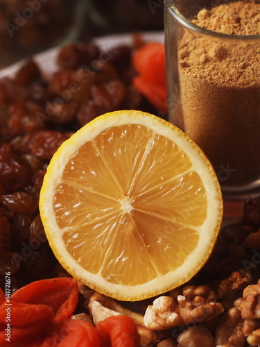 raisins dried apricots in a glass jar photo