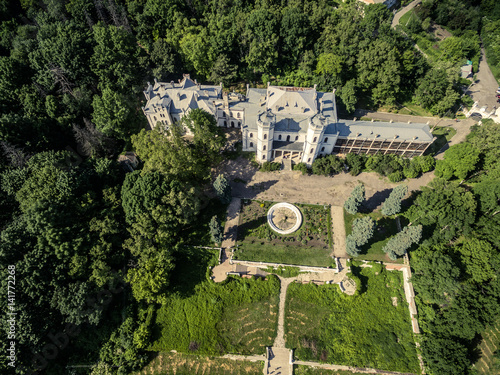 beautiful aerial view on White Swan palace and yard in Sharivka park, Kharkiv region, Ukraine photo