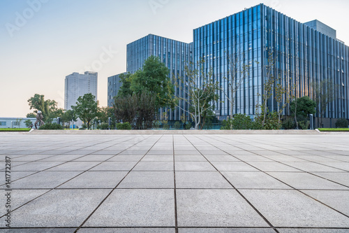 Canvas Print Empty floor with modern business office building