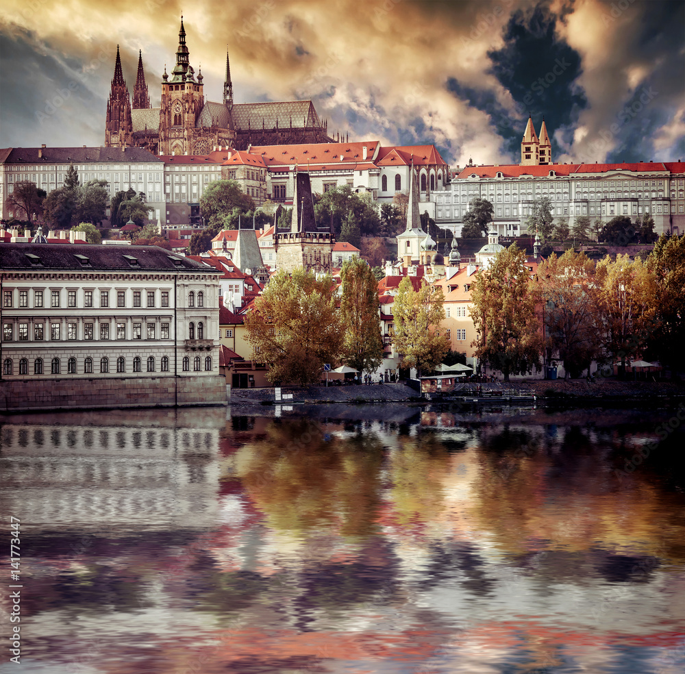 View of old town and Prague castle with river Vltava at sunset