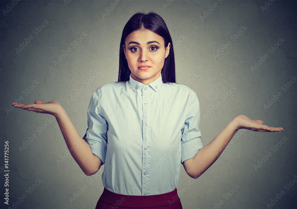 Woman with arms out shrugs shoulders so what I don't know Woman with arms out shrugs shoulders so what I don't know