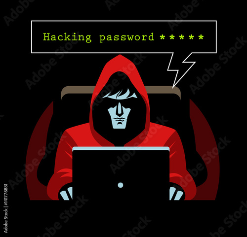 hacker stalker using a computer in the darkness
