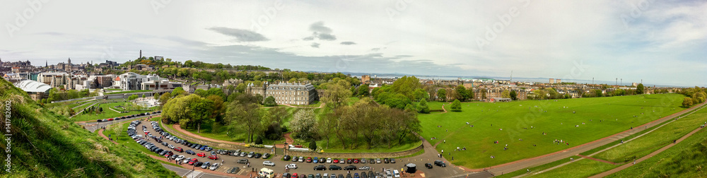 A panorama mountain view frames Scotland's skyline, an infamous tourist hill perched above the city grounds in Edinburgh
