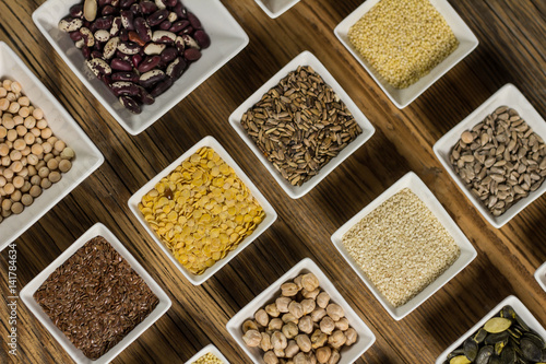 Assortment of legumes, grain and seeds. Various types of grains, rice, legumes spices and herbs