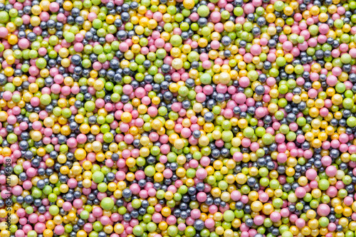 Multicoloured sweet sugar balls. Small ball pattern. © gitusik