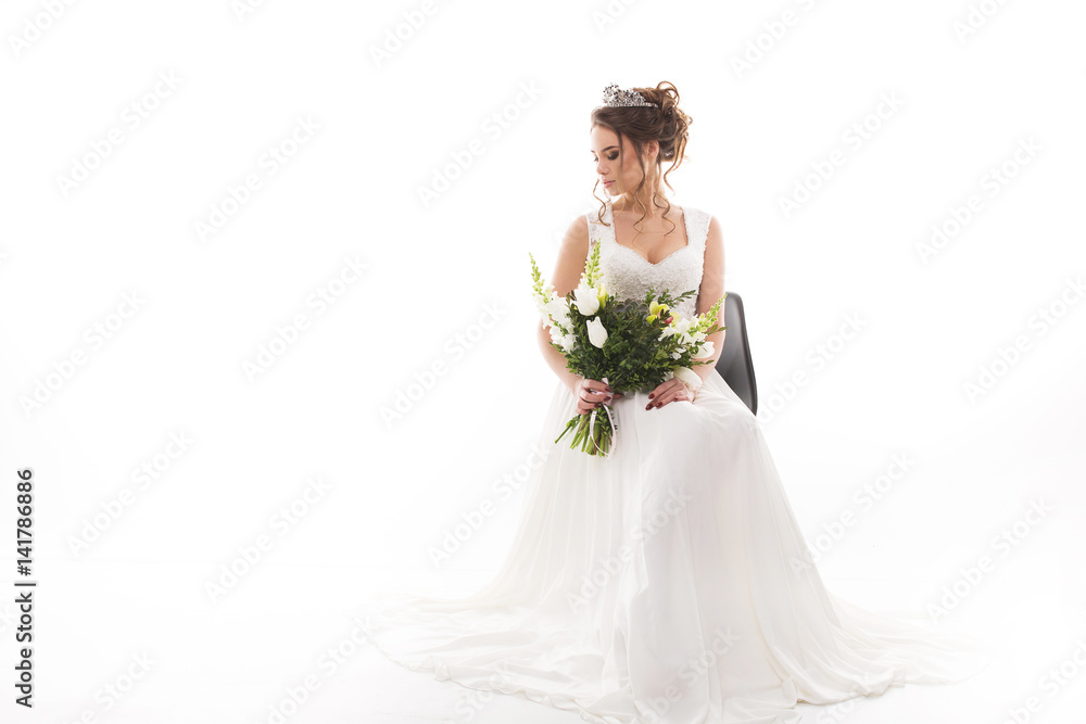 Young attractive bride with the bouquet of flowers Young attractive bride with the bouquet of flowers
