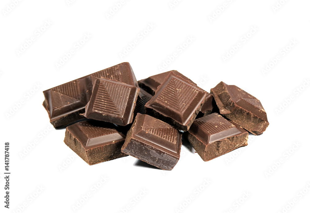 Close-up of Dark Chocolate Cubes Isolated on White Background Close-up of Dark Chocolate Cubes Isolated on White Background