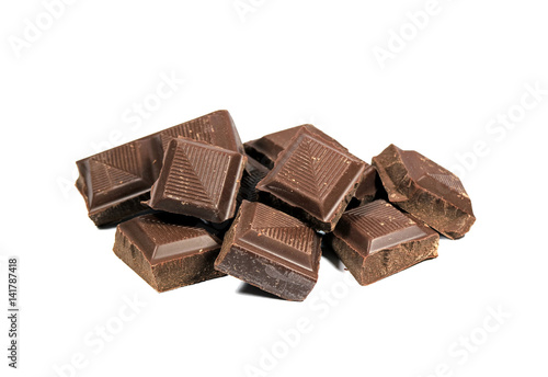 Close-up of Dark Chocolate Cubes Isolated on White Background 
