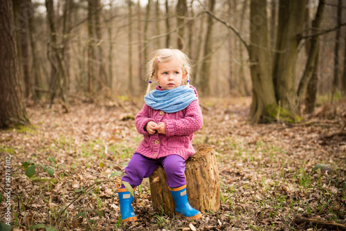 Thoughtful girl in the wood