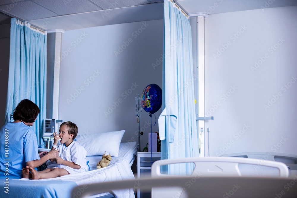 Patient using inhaler Patient using inhaler