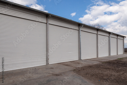 Wallpaper Mural Storage units with roller shutter doors in industrial area Torontodigital.ca