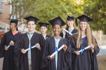 Portrait of graduate school kids standing 