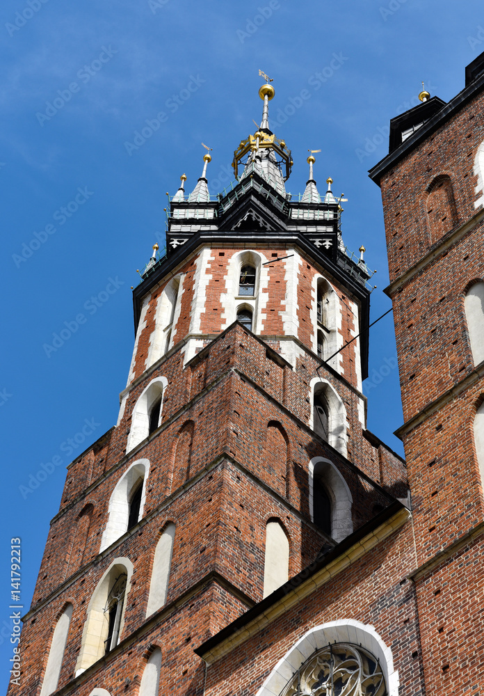 St. Mary Church towers in Market square in Krakow in Poland